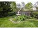 Manicured lawn showcasing a decorative fountain, surrounded by well-maintained landscaping and greenery at 1920 E 81St St, Indianapolis, IN 46240