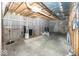 Unfinished basement with visible pipes, concrete walls, and floor is prepped for customization at 1920 E 81St St, Indianapolis, IN 46240