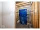 Partially finished basement space with shelving behind protective covering, a blank canvas for your design ideas at 1920 E 81St St, Indianapolis, IN 46240