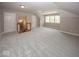 Large bonus room with new carpet, two closets, an attic access point and a window at 1920 E 81St St, Indianapolis, IN 46240