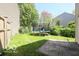 Green backyard featuring a trampoline and a fenced perimeter at 2277 Grand Fir Dr, Greenwood, IN 46143
