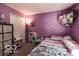 Comfortable bedroom with cute heart-shaped wall decals and built-in storage at 2277 Grand Fir Dr, Greenwood, IN 46143
