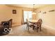 Bright dining area featuring a round table and comfortable seating at 2277 Grand Fir Dr, Greenwood, IN 46143