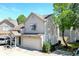 Inviting exterior of a two-story home featuring a garage, neutral siding, and well-maintained landscaping at 2277 Grand Fir Dr, Greenwood, IN 46143