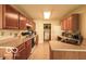 Functional kitchen featuring essential appliances and ample cabinet space at 2277 Grand Fir Dr, Greenwood, IN 46143