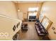 Open living room with ample sunlight, a ceiling fan, and comfortable furniture at 2277 Grand Fir Dr, Greenwood, IN 46143