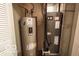 Utility closet featuring a water heater, furnace, and an air conditioning unit at 2277 Grand Fir Dr, Greenwood, IN 46143