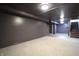Neutral-painted basement with carpet and vinyl flooring at 2305 Caldwell Pl, Columbus, IN 47201