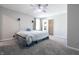 Spacious main bedroom featuring carpet floors, natural light, and a walk-in closet at 2305 Caldwell Pl, Columbus, IN 47201