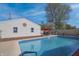 Inviting in-ground pool adjacent to a sunroom, perfect for relaxation and entertainment at 2305 Caldwell Pl, Columbus, IN 47201