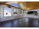 Inviting sunroom with wood ceiling, many windows, and dark hardwood flooring at 2305 Caldwell Pl, Columbus, IN 47201