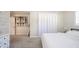 Bedroom with neutral walls, a comfortable bed, a modern dresser, and ample natural light at 231 N East St, Pendleton, IN 46064