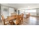 Open concept: Spacious dining room leading into a bright kitchen with island seating at 231 N East St, Pendleton, IN 46064
