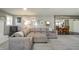 Cozy living room with a fireplace and an open view to the dining area at 231 N East St, Pendleton, IN 46064