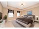 Spacious bedroom featuring tray ceilings and ample natural light at 2342 Sheek Rd, Greenwood, IN 46143