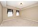 Spacious bedroom with cozy carpeting, bright natural light, and simple ceiling fan at 2342 Sheek Rd, Greenwood, IN 46143