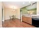 Dining area featuring modern chandelier and open access to kitchen at 2342 Sheek Rd, Greenwood, IN 46143