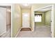 Inviting foyer with neutral walls, carpet, and a front door view, leading to other rooms in the home at 2342 Sheek Rd, Greenwood, IN 46143
