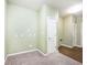 Neutral laundry room with plush carpeting, neutral walls, and access to another room at 2342 Sheek Rd, Greenwood, IN 46143
