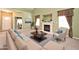 Inviting living room boasts natural light, plush seating, and fireplace at 2342 Sheek Rd, Greenwood, IN 46143