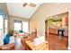 Bright living room showcases vaulted ceilings and access to the kitchen at 2342 Sheek Rd, Greenwood, IN 46143