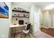 Functional office space with built-in desk and shelving for organization at 2342 Sheek Rd, Greenwood, IN 46143