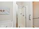 Bathroom shower stall with frameless glass door and chrome fixtures at 2342 Sheek Rd, Greenwood, IN 46143