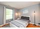 Comfortable bedroom featuring contemporary décor and a large window for ample natural light at 2523 Gammon Dr, Indianapolis, IN 46234