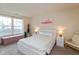 Inviting bedroom featuring neutral decor and plenty of natural light from a large window at 2523 Gammon Dr, Indianapolis, IN 46234