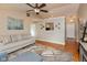 Stylish living room featuring an open floor plan, hardwood floors, and natural light at 2523 Gammon Dr, Indianapolis, IN 46234