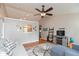 Bright living room with a ceiling fan, hardwood floors, and plenty of natural light at 2523 Gammon Dr, Indianapolis, IN 46234