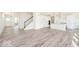 Bright, open-concept living space features modern finishes and an inviting atmosphere with white walls at 2717 Penn Ave, Plainfield, IN 46168
