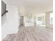 Bright, open-concept living space features modern finishes and an inviting atmosphere with white walls at 2717 Penn Ave, Plainfield, IN 46168