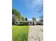 Charming house featuring well-maintained lawn and a spacious driveway leading to an attached garage at 2871 N Talley Rd, Columbus, IN 47203