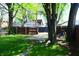 Quaint backyard with well-maintained lawn, ideal for outdoor relaxation and recreation at 321 Harlan St, Indianapolis, IN 46201