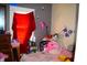 A room with a playful style and colorful decor offers a warm and inviting atmosphere at 321 Harlan St, Indianapolis, IN 46201