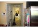 View of hallway, appliances, and doors at 321 Harlan St, Indianapolis, IN 46201