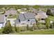 Aerial view of a backyard with patio furniture in a lush green neighborhood at 3387 Keystone Pass, Plainfield, IN 46168