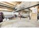 Unfinished basement providing ample space for storage, fitness, or a recreational area at 3387 Keystone Pass, Plainfield, IN 46168