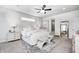 Serene bedroom with soft textures, decorative pillows, and ample natural light at 3387 Keystone Pass, Plainfield, IN 46168