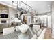 Elegant dining room showcasing an open floor plan and modern light fixture at 3387 Keystone Pass, Plainfield, IN 46168