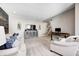 Spacious living room with modern entertainment center and comfortable seating at 3387 Keystone Pass, Plainfield, IN 46168