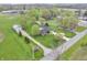 Aerial view of a home, an outbuilding, green lawn, and a long driveway at 3710 E 750 S, Lebanon, IN 46052