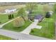 Sprawling aerial view of a home with a large yard, outbuildings, and a long driveway at 3710 E 750 S, Lebanon, IN 46052