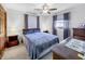 Comfortable bedroom with a bed, side table, and natural light at 3710 E 750 S, Lebanon, IN 46052