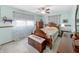 Charming bedroom with wood furniture, fan and ceiling light at 3710 E 750 S, Lebanon, IN 46052