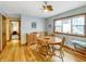 Bright dining area with hardwood floors, wood furniture, and natural light from the window at 3710 E 750 S, Lebanon, IN 46052