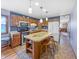 Spacious kitchen with oak cabinets, island with seating, and modern appliances at 3710 E 750 S, Lebanon, IN 46052
