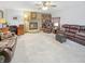 Cozy living room features a stone fireplace, built-in bookshelves, and comfortable seating at 3710 E 750 S, Lebanon, IN 46052