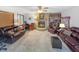 Bright living room offers a stone fireplace, built-in shelves, and lots of natural light at 3710 E 750 S, Lebanon, IN 46052
